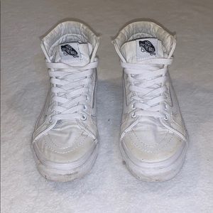 All white high top vans